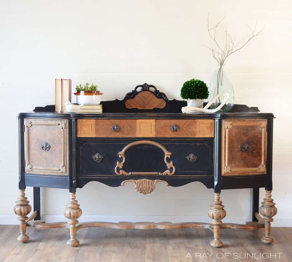 black painted antique buffet after with natural wood legs and accents