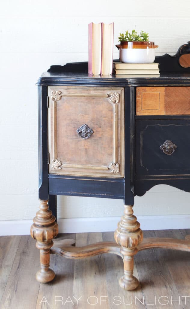 black painted antique buffet with natural wood legs and drawers