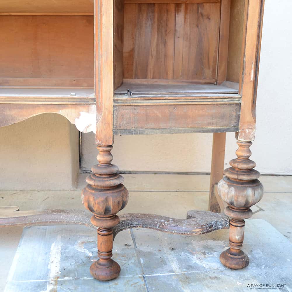 antique buffet legs after removing stain and making veneer repairs