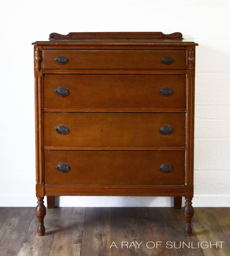 antique highboy dresser with four drawers