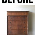 Antique wooden dresser with brass handles, vintage furniture, classic home decor, natural wood finish, rustic bedroom storage.