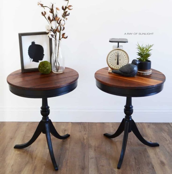 Black end tables with stained wood tops