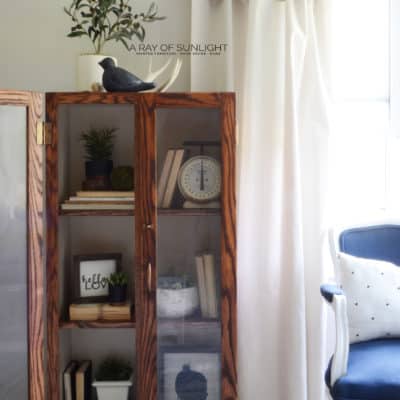 This old gun cabinet was transformed into a modern farmhouse cabinet with general finishes and some new shelving - The Farmhouse Cabinet Makeover by A Ray of Sunlight | Perfect for our farmhouse living room! #farmhousecabinet #paintedfurniture
