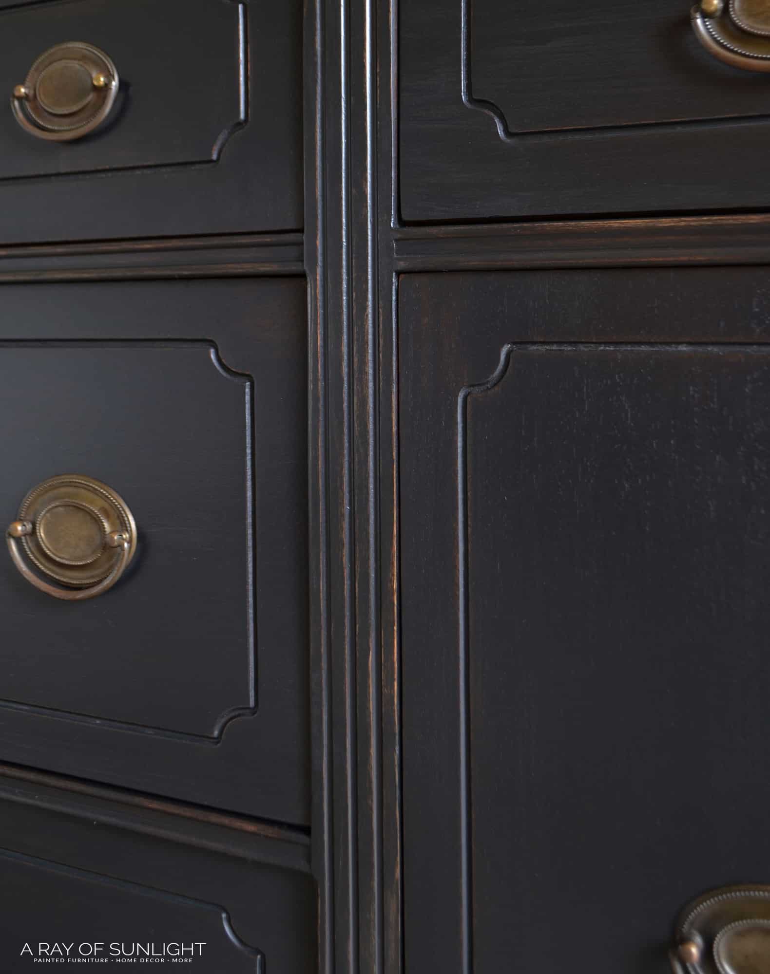 close up on the weathered black finish on the furniture