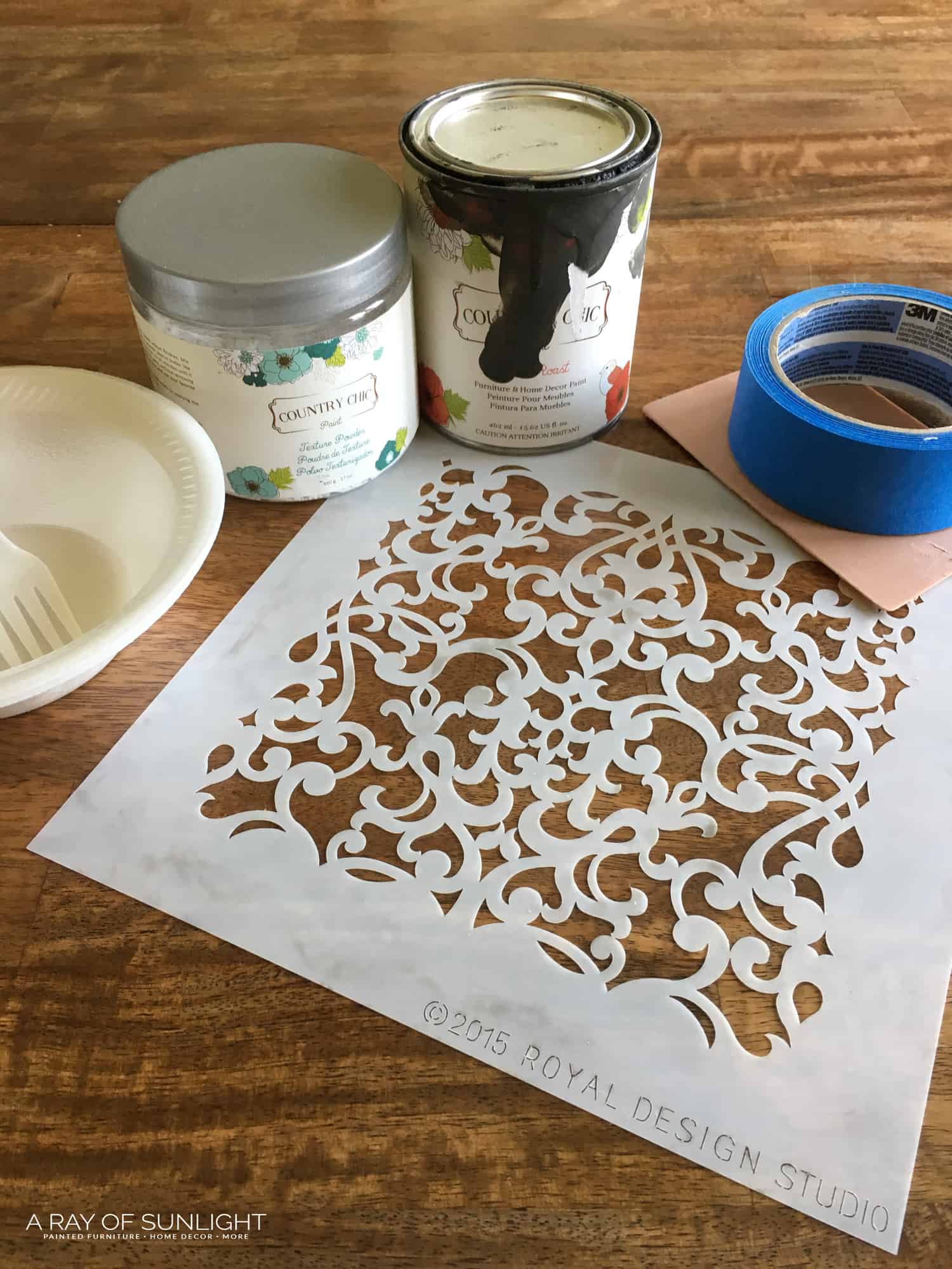 Supplies for creating raised stencil on furniture