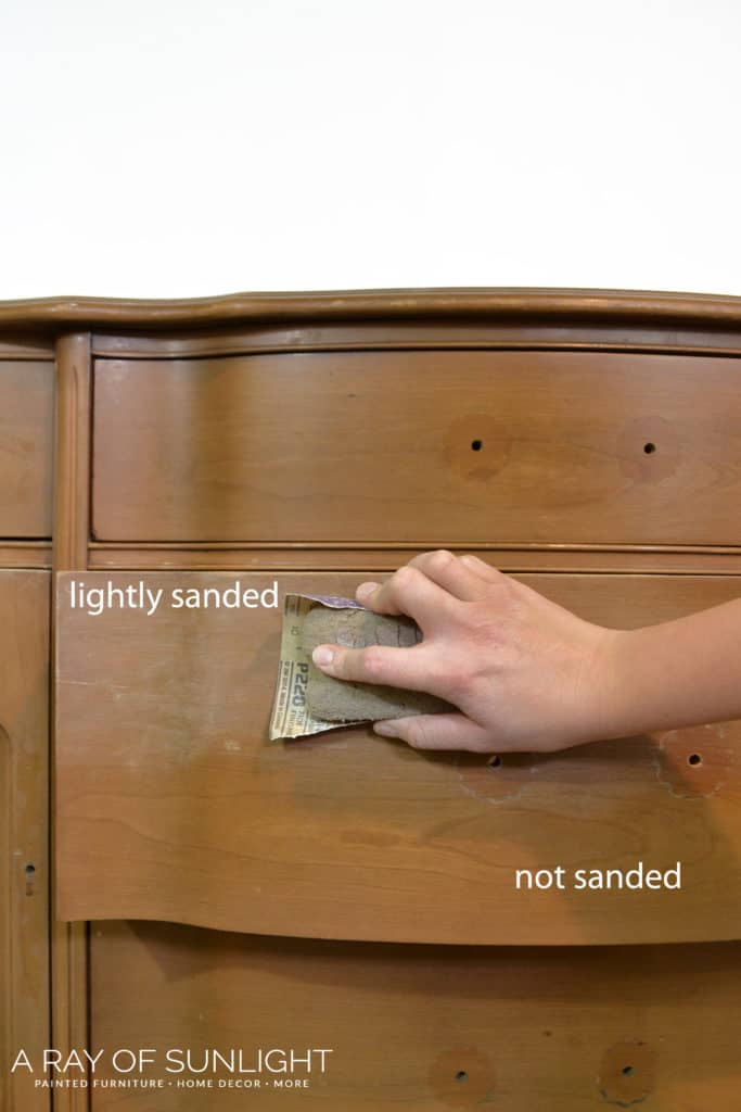 scuff sanding a drawer before painting