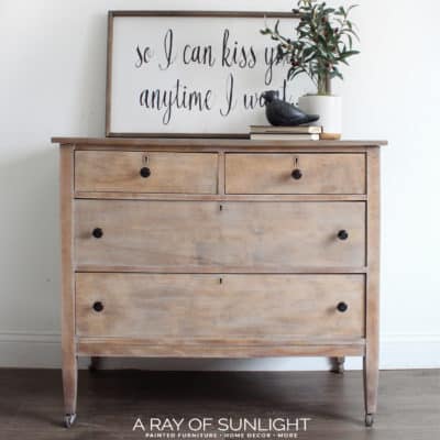 How to redo your thrifted bedroom furniture in a painted natural weathered wood look. Including stripping furniture, diy whitewash with chalk paint and sealing the painted finish. Refurbish your old dressser for your rustic farmhouse bedroom. By A Ray of Sunlight #diyfurniture #diybedroom #thriftedfurniture