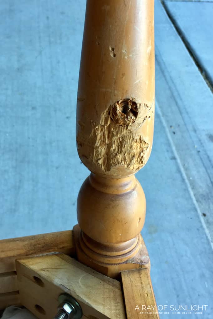 Damaged and chewed up chair leg