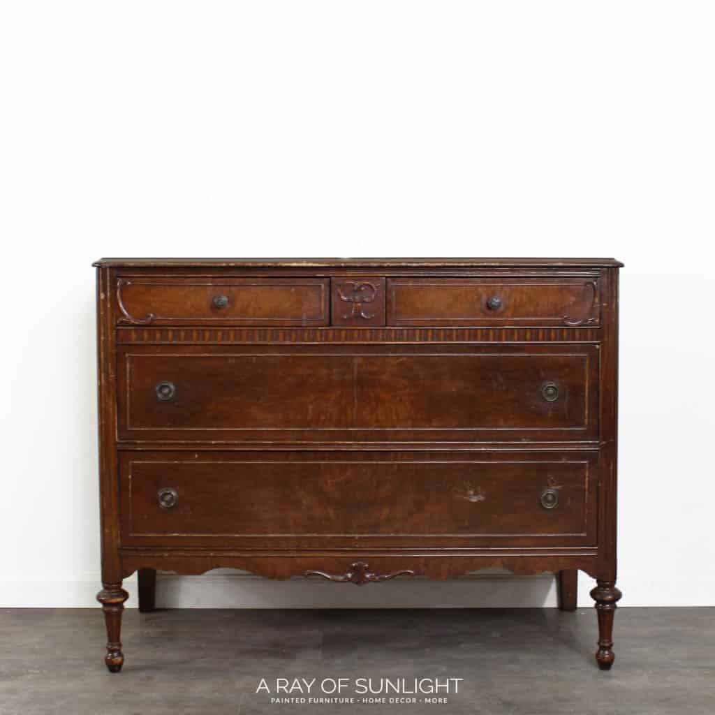 Old vintage dresser with natural wood finish
