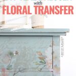 close up photo of light teal painted dresser with floral transfers