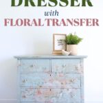 light blue painted dresser with floral transfers