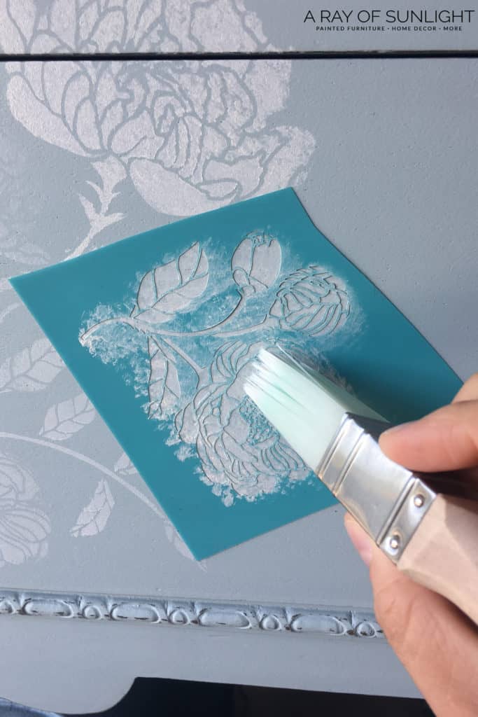 painting floral stencil white