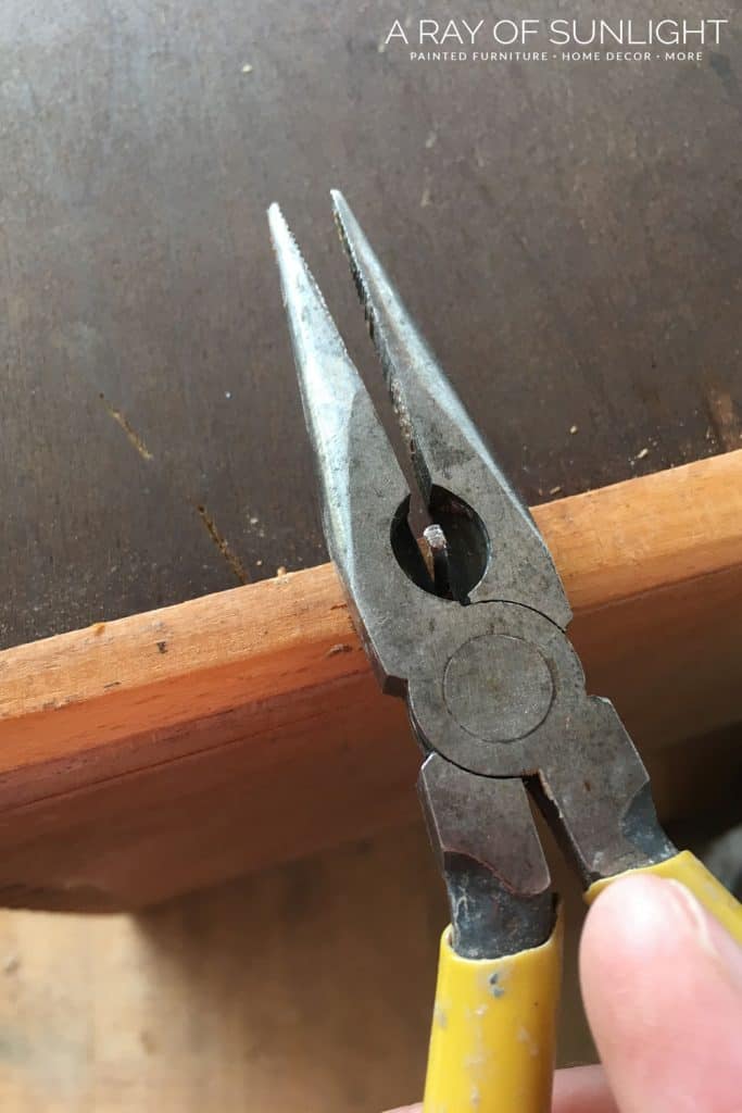 Remove nail with a pair of pliers