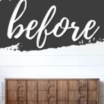 A wooden dresser in front of a white wall with before written in large script above it.