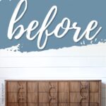 A wooden dresser sits in front of a wall with before written in large script on a blue background.