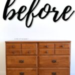 A wooden dresser with six drawers against a white wall with before written in large script above it.