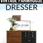 A dresser half painted black and half brown stands beneath a farmhouse sign and decor; before and after shown.