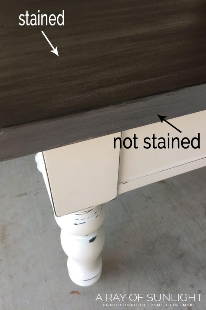Stained and not stained parts of table