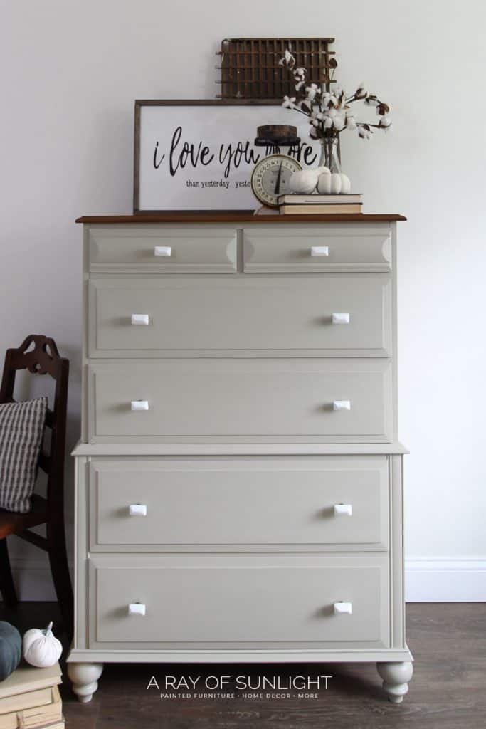 full view of tall dresser painted and with new bun feet added