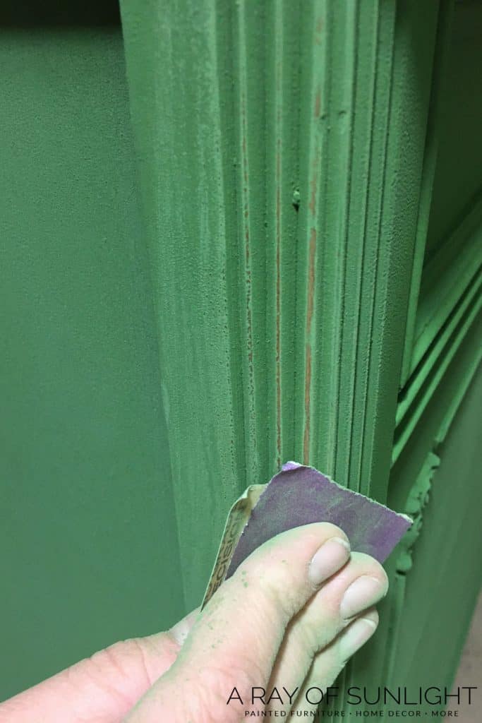 distressing milk paint with sandpaper