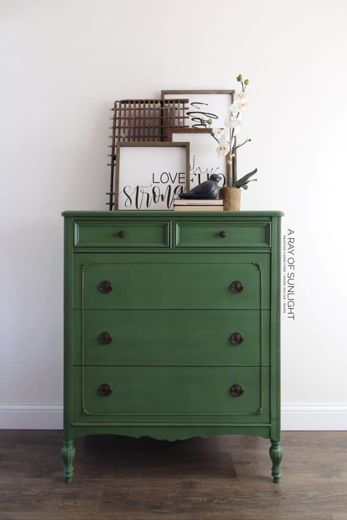 full shot of emerald green painted dresser