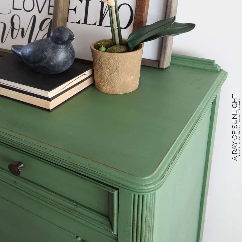 closeup of emerald green painted dresser top