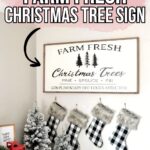 White wall with a “Farm Fresh Christmas Trees” sign, mini flocked trees, and plaid stockings hanging below.