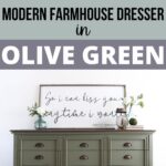 Olive green mid-century modern farmhouse dresser with decor and a framed quote on top.