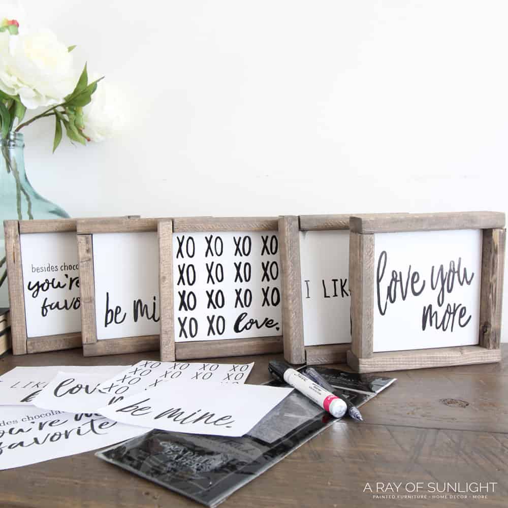 small wooden love signs