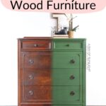 A wooden dresser half restored with green paint, showing a before and after comparison.