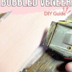 Hand holding a tool, repairing bubbled veneer on wood