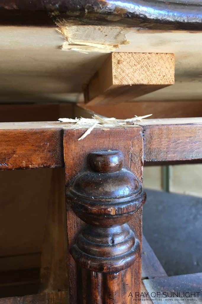 closeup of pulling the top of a desk off