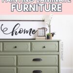 Green dresser with black handles under a home sign; text above reads The Secrets to Painting Laminate Furniture.