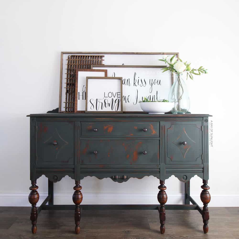 dark green painted distressed buffet with stained legs