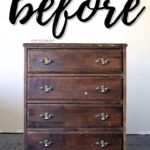 Worn wooden dresser with three drawers and before written in large script above it.