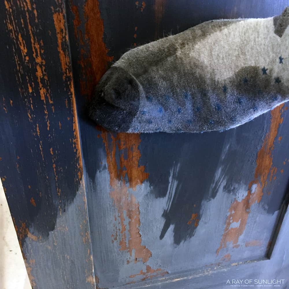 how to seal milk paint with wax - use a sock!