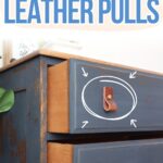 Blue dresser with leather pulls; text reads DIY Leather Pulls with arrow pointing to a leather drawer pull.