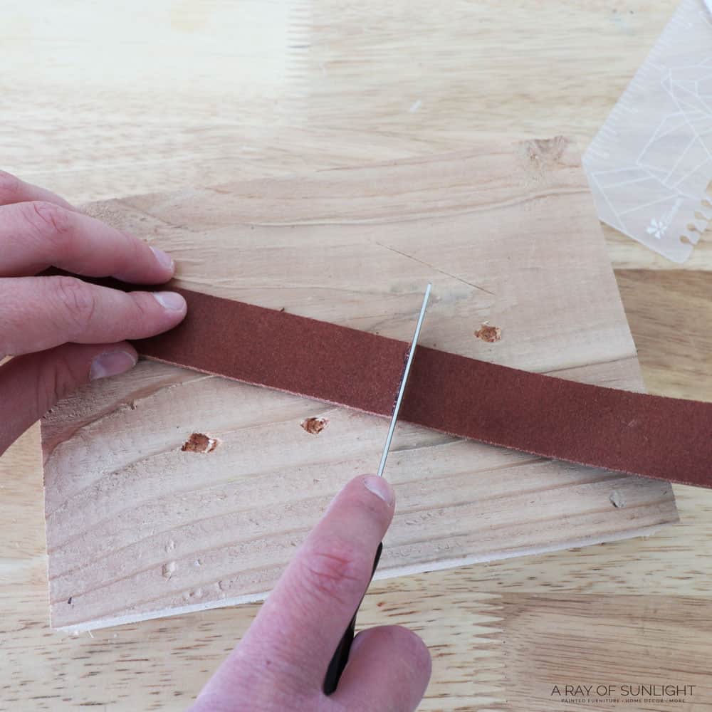 cut leather with a knife