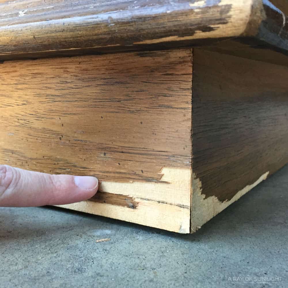 pointing chipped wood veneer on furniture