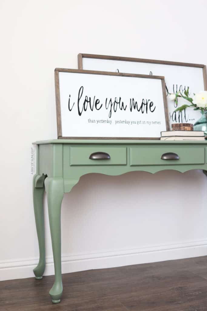  full view of a green painted sofa table