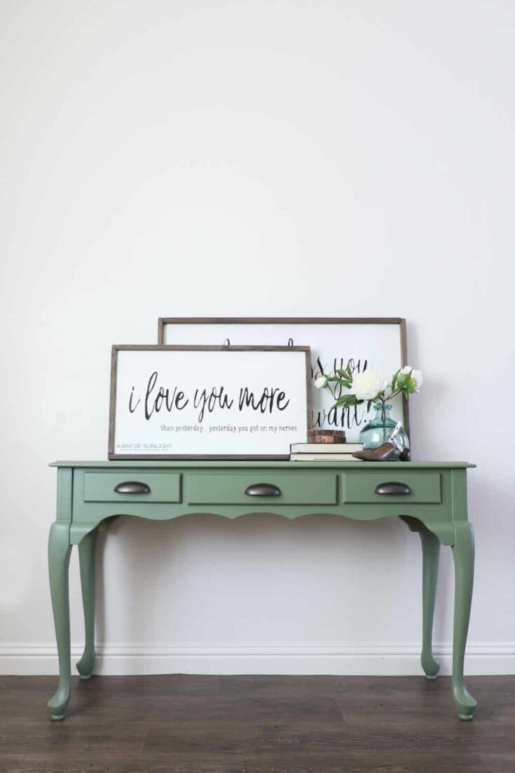 full view of a green painted sofa table
