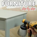 A person uses a paint sprayer to paint a small laminate table; text reads How to Paint Laminate Furniture.