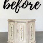 A vintage, cream-colored cabinet with before written in large black script above it.
