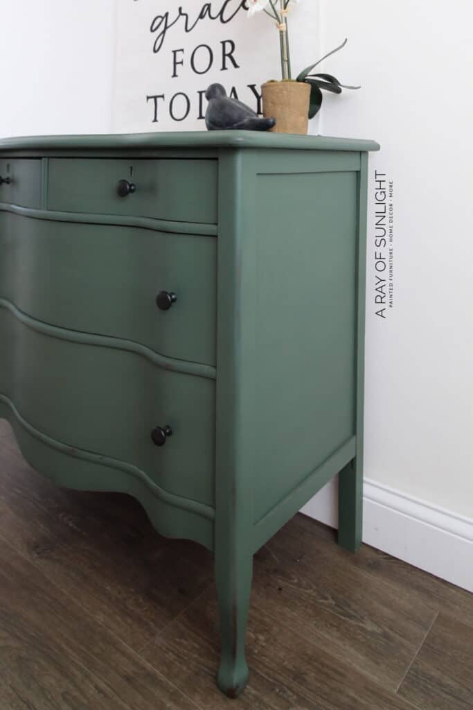 side angle of dark green painted dresser