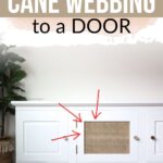 White cabinet with cane webbing on one door, marked by red arrows, against a white wall.