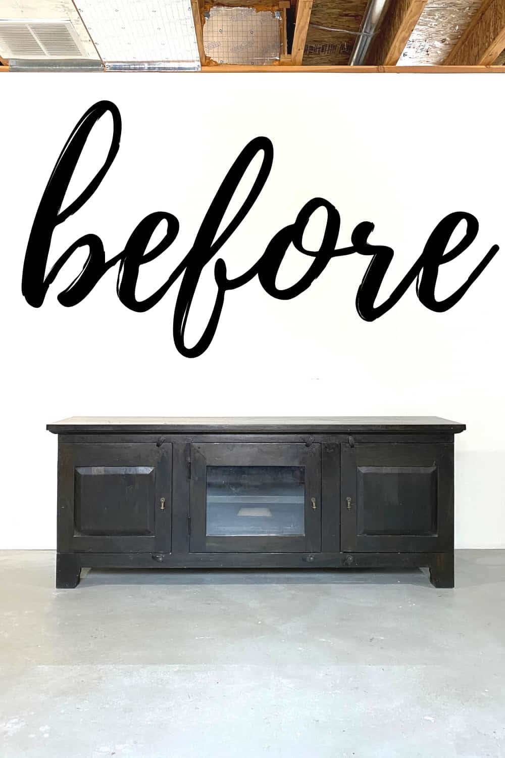 dark tv stand before the makeover