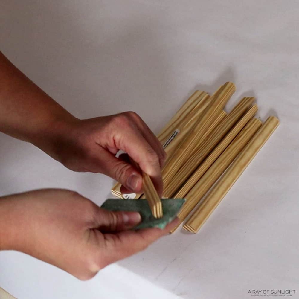 sanding edges of wood dowels by hand