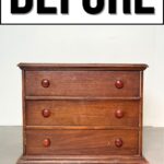 A worn, three-drawer wooden dresser sits below a large BEFORE sign.