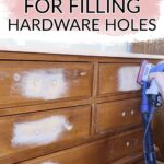 sanding patches on a wooden dresser, filling hardware holes with putty.