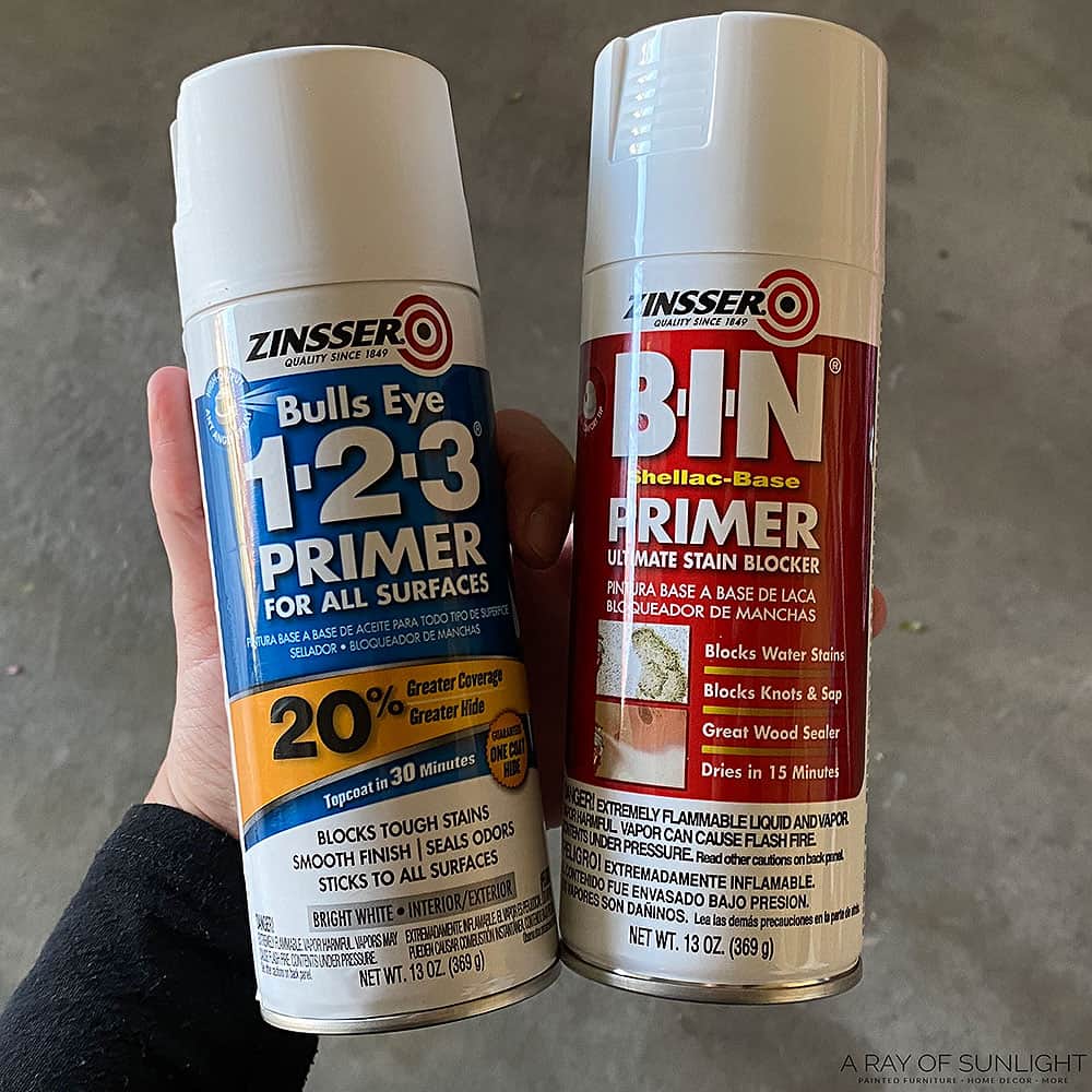 Bottles of Bin Shellac spray primer and 123 Primer